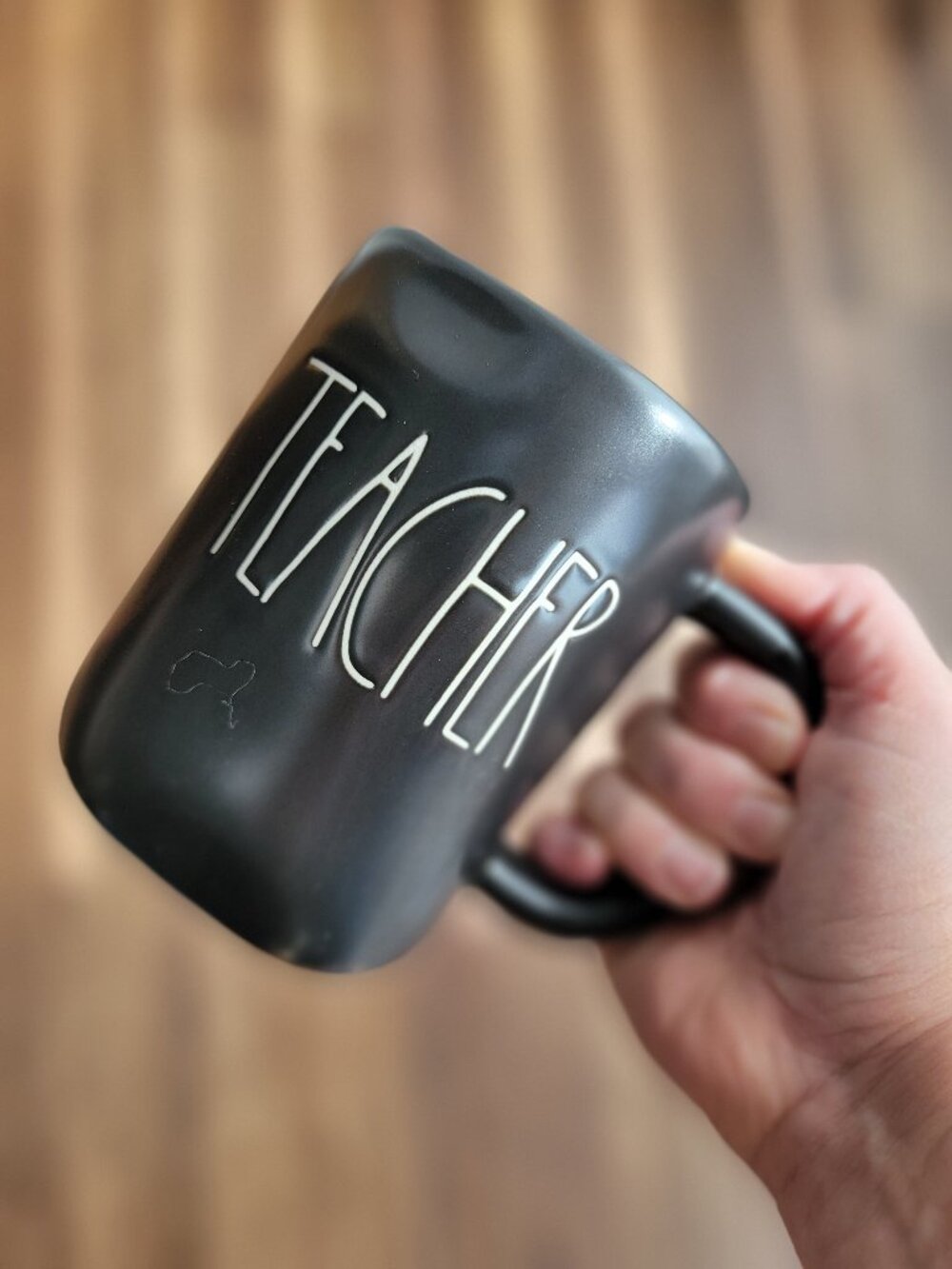 Rae Dunn ceramic mug by Magenta, "Teacher in white lettering on black glaze EUC
